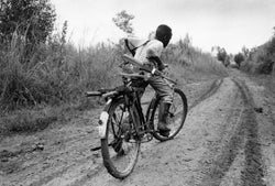 A child soldier rides back to his base in Ituri Province, Congo. � 2004 Marcus Bleasdale