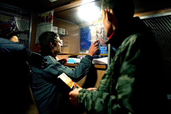Injection drug users at a needle exchange point.
&copy; 2007 Lorena Ros
 

