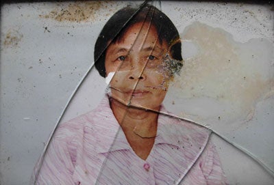 Cover: Clarita Gragasin, 61, traveled to the Koronadal market on May 10, 2003, to shop for some food. She was sitting in a rickshaw tricycle, preparing to return home, when a bomb detonated about five meters from her. Shrapnel from the bomb hit her face, abdomen, arms, and legs, killing her instantly. Clarita left behind three daughters: Zenaida, Maribeth, and Narissa.  2006 John Sifton/Human Rights Watch