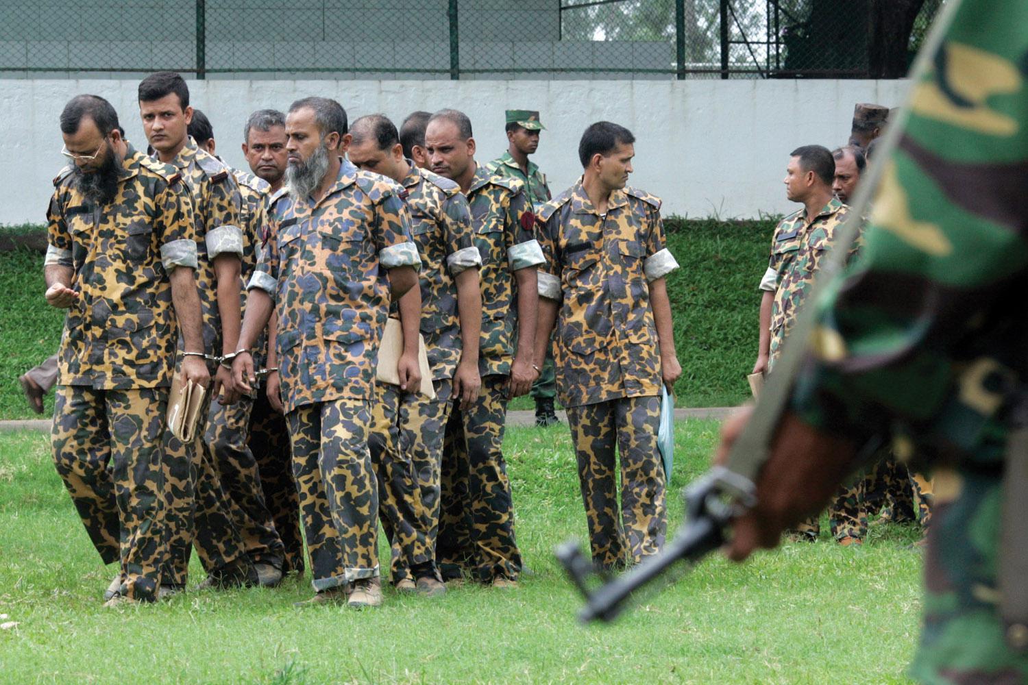 Members of Bangladesh Rifles (BDR) accused of mutiny are summoned for a hearing before a special court in Dhaka July 12, 2010.
