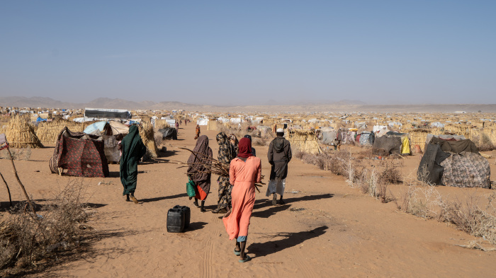 Displaced women and girls walk through the vast IDP site in Tawila, Sudan, February 23rd, 2026.