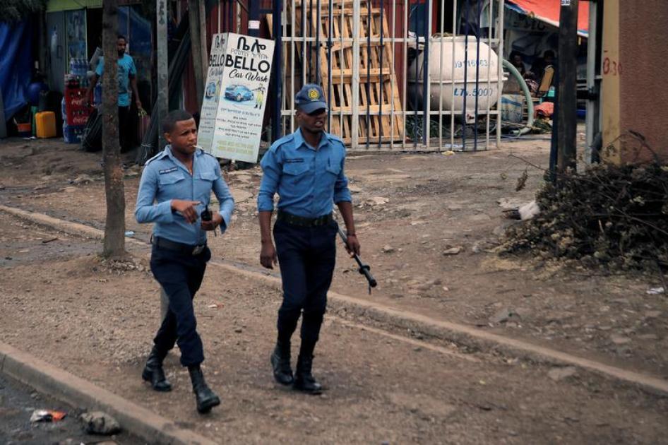 Police officers patrol along a road in Addis Ababa, Ethiopia, February 21, 2018. © 2018 Reuters