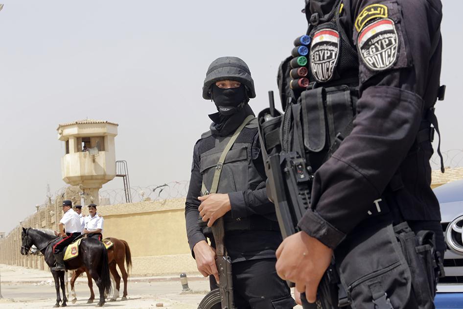 Egyptian policemen secure Egypt’s national police academy. © 2015 AP Photo/Amr Nabil