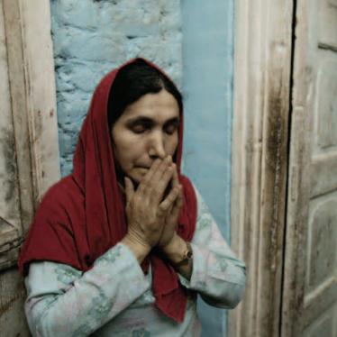 The mother of Bashir Ahmad Mir, Mahuda, cries while recalling her son who went missing in Bijbehara, Kashmir. Bashir joined an armed militant group in 1990 when he was fifteen years old and was arrested in 1994 by Indian security forces. He has never been seen again. 