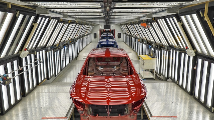 Cars are delivered on a production line at SAIC General Motors Dongyue Automobile Co. Ltd. in Yantai, Shandong province, China, November 17, 2022.