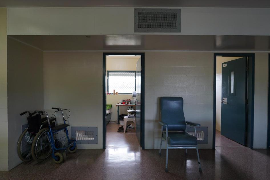 A wheelchair outside a room in Wolston Correctional Centre, Queensland.