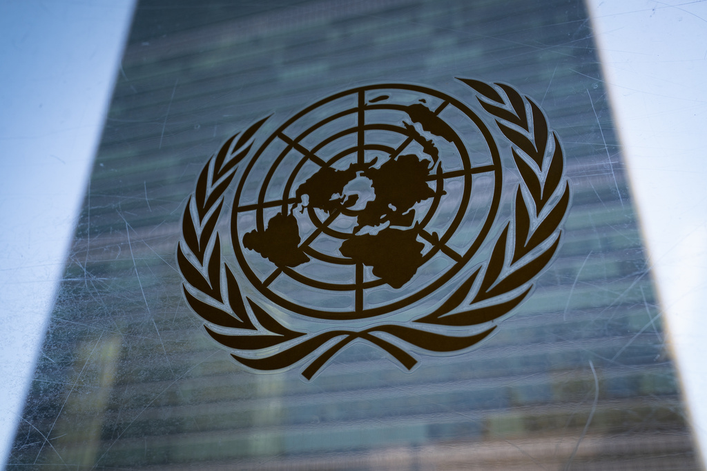 The symbol of the United Nations is displayed outside the Secretariat Building, Feb. 28, 2022, at United Nations Headquarters. (AP Photo/John Minchillo, File)