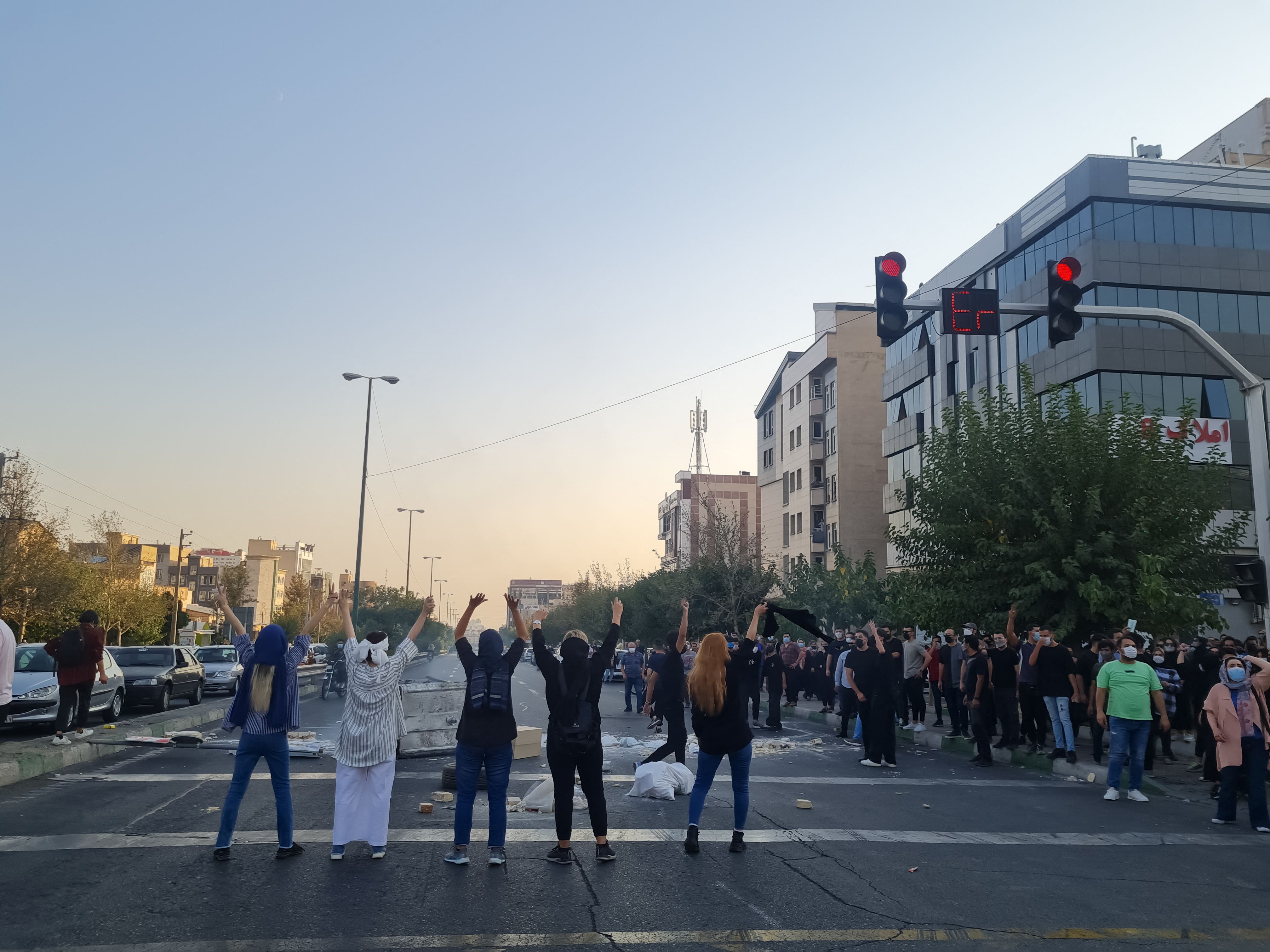 Iranian women, defying the mandatory hijab rule, take to the streets during nationwide protests that started after 22-year-old Mahsa (Jina) Amini died on September 16, 2022 in the custody of Tehran’s “Morality Police,” October 1, 2022.