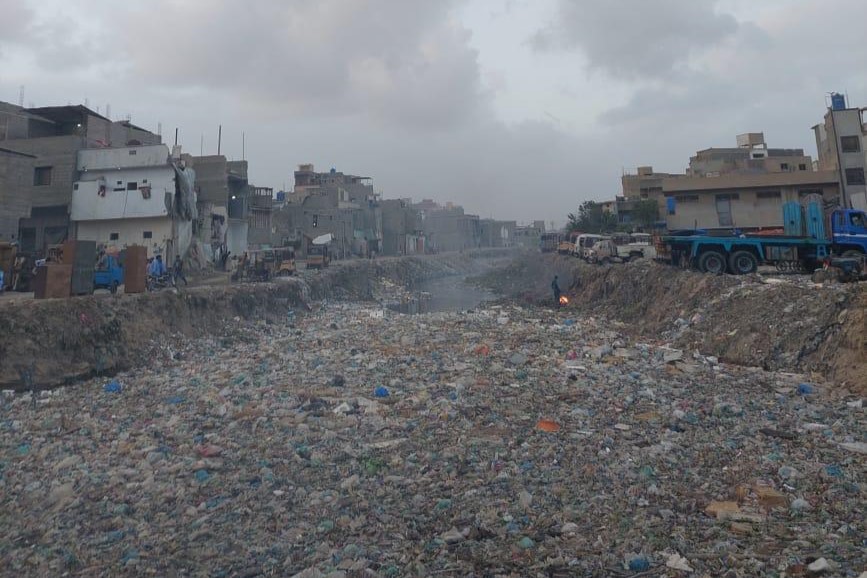 A section of a stormwater channel in Karachi clogged with solid waste