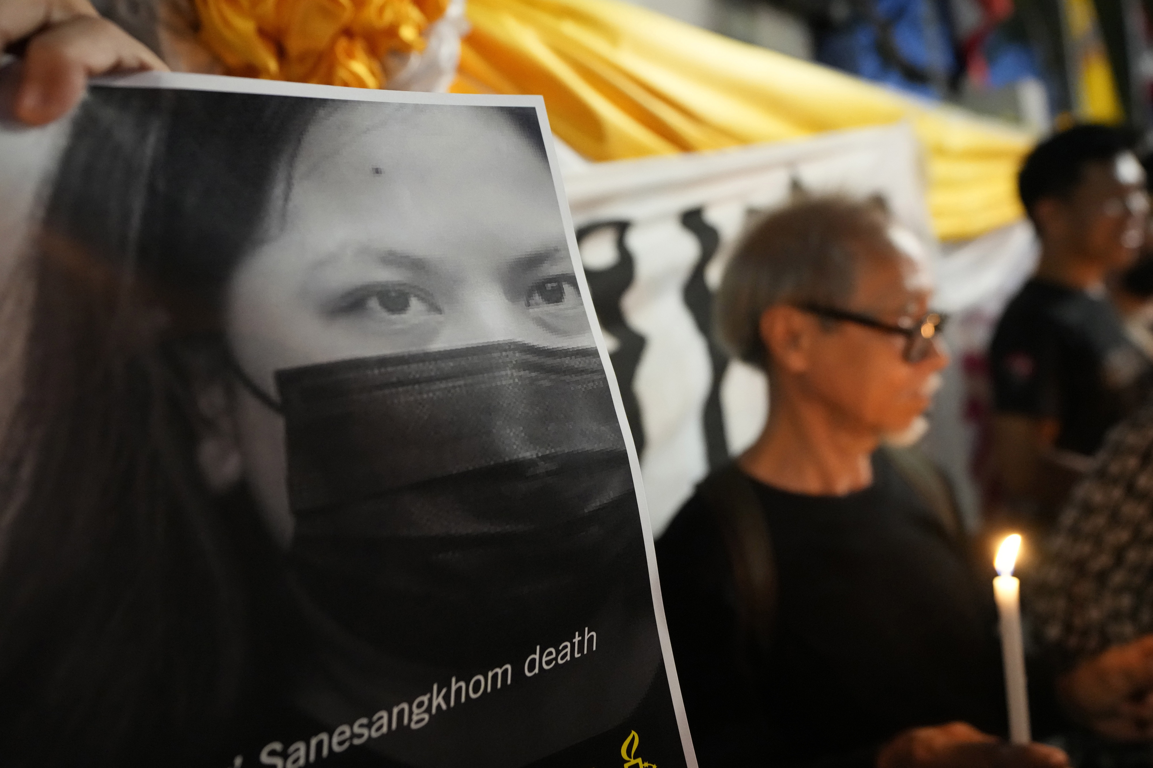 Thai activists hold a portrait of Netiporn “Bung” Sanesangkhom outside of a criminal court in Bangkok, Thailand, on May 14, 2024.