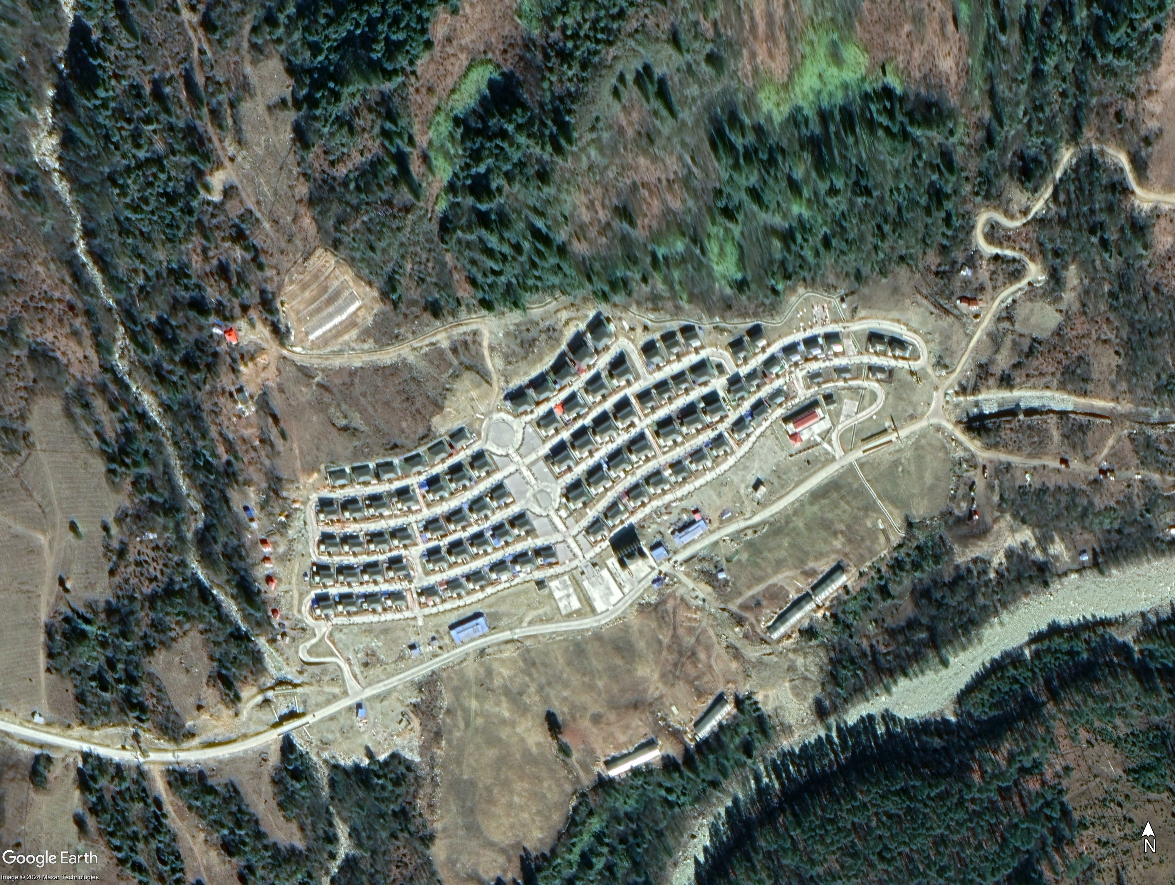 Satellite image showing the new Duolonggang village