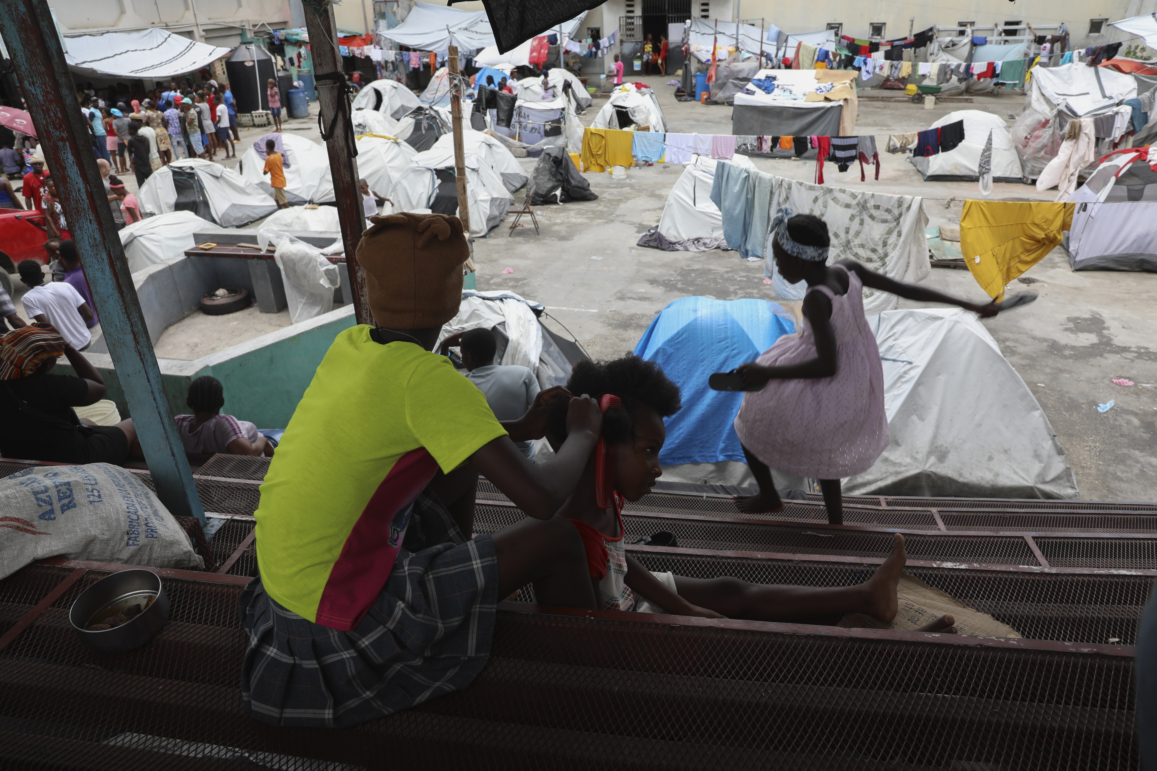 The grounds of a gymnasium converted into a makeshift shelter for people displaced by gang violence, in Port-au-Prince, Haiti, May 3, 2024. 