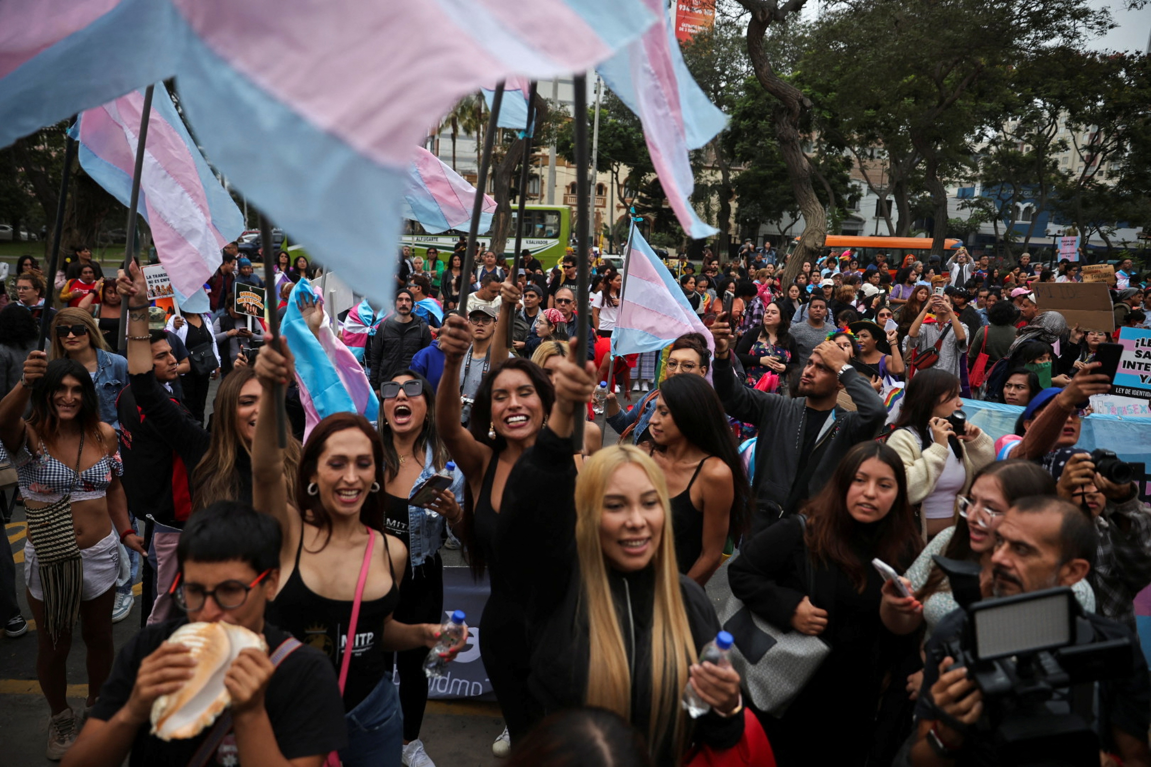 Peruvians protest in front of Peru's Ministry of Health against a presidential decree classifying transgender identities as mental health conditions in Lima, Peru, May 17, 2024.