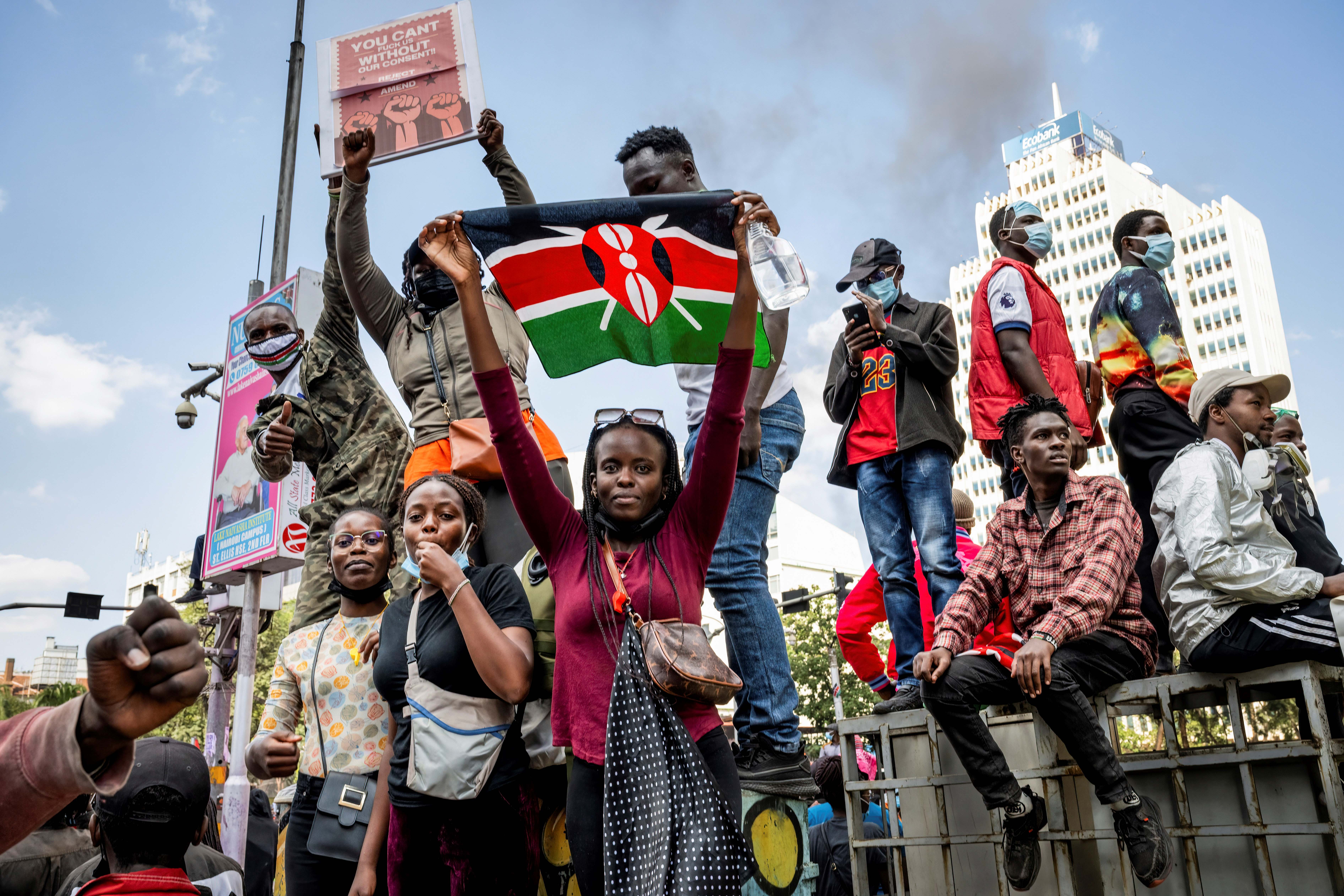 A protester holds a Kenyan flag during the nationwide demonstration against proposed legislation which would increase taxes across the country's economy.