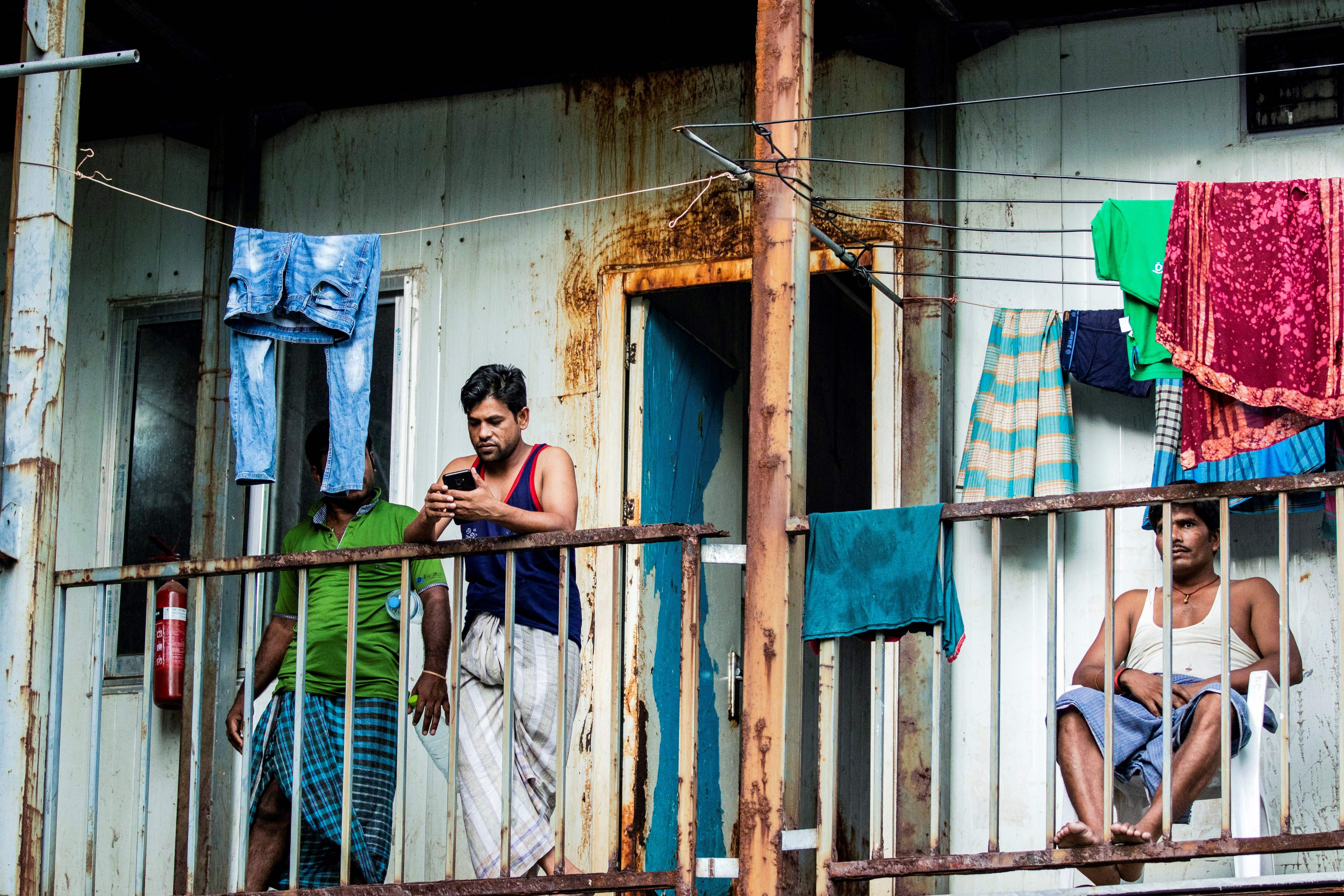 Workers from Bangladesh gathering in their accommodation block in Malé, Maldives, May 9, 2020. 