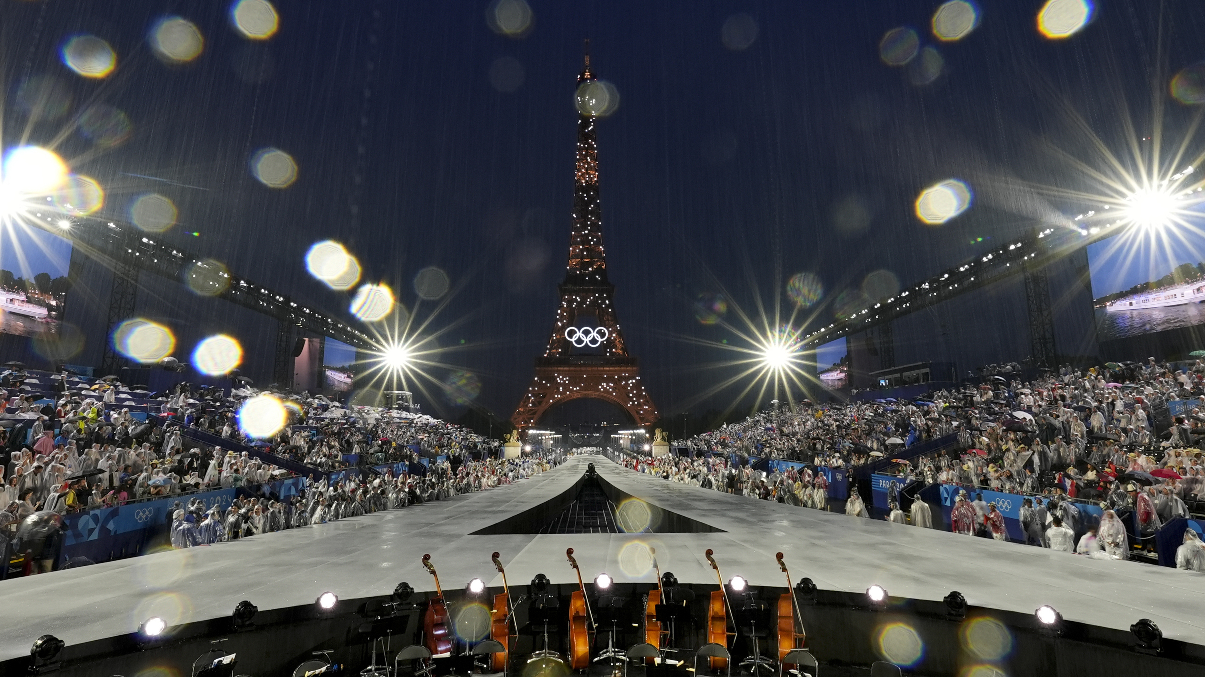 Rain pours down in Paris, France, during the opening ceremony of the 2024 Summer Olympics, Friday, July 26, 2024.