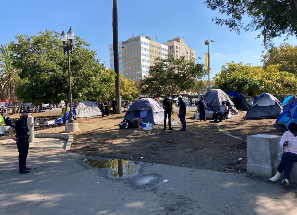 A tent encampment in a city park