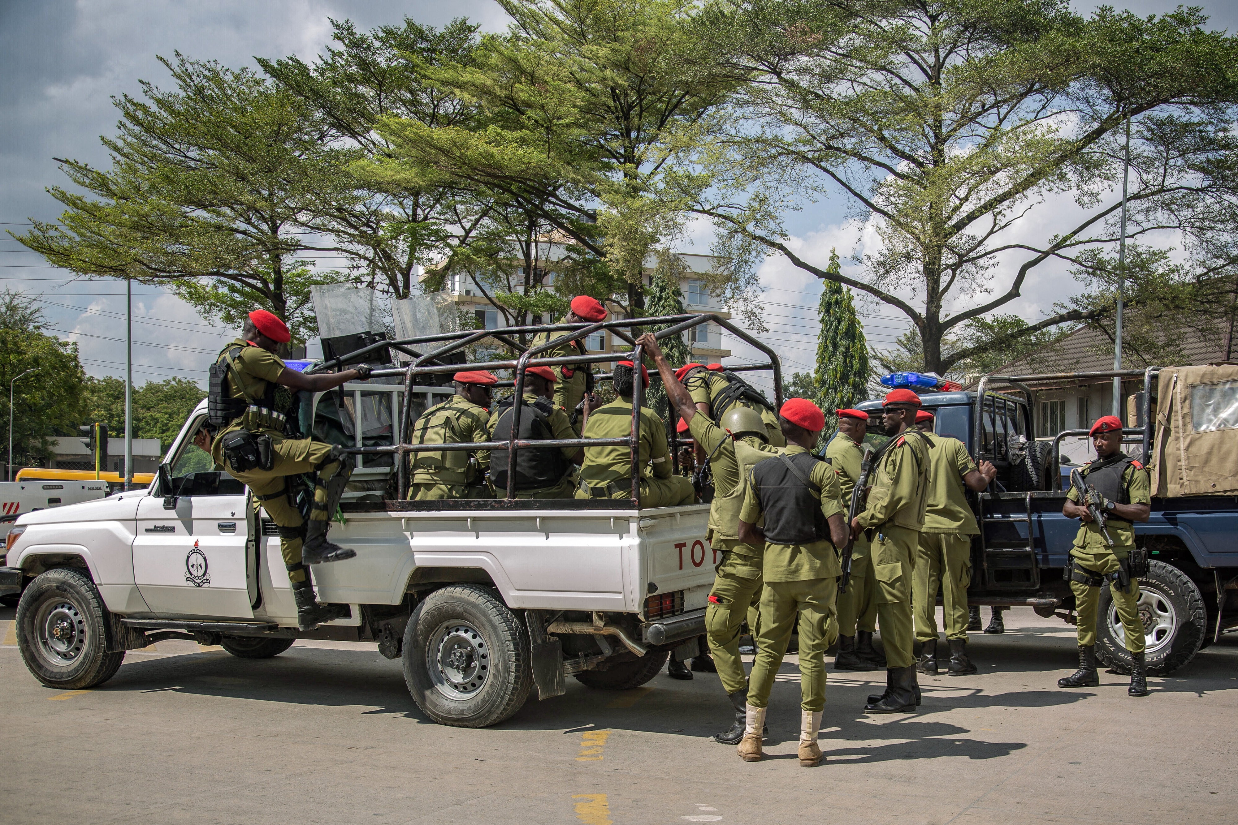 Tanzanian police officers patrol the streets ahead of a demonstration over the alleged kidnapping and killing of opposition party members, Dar es Salaam, September 23, 2024. 