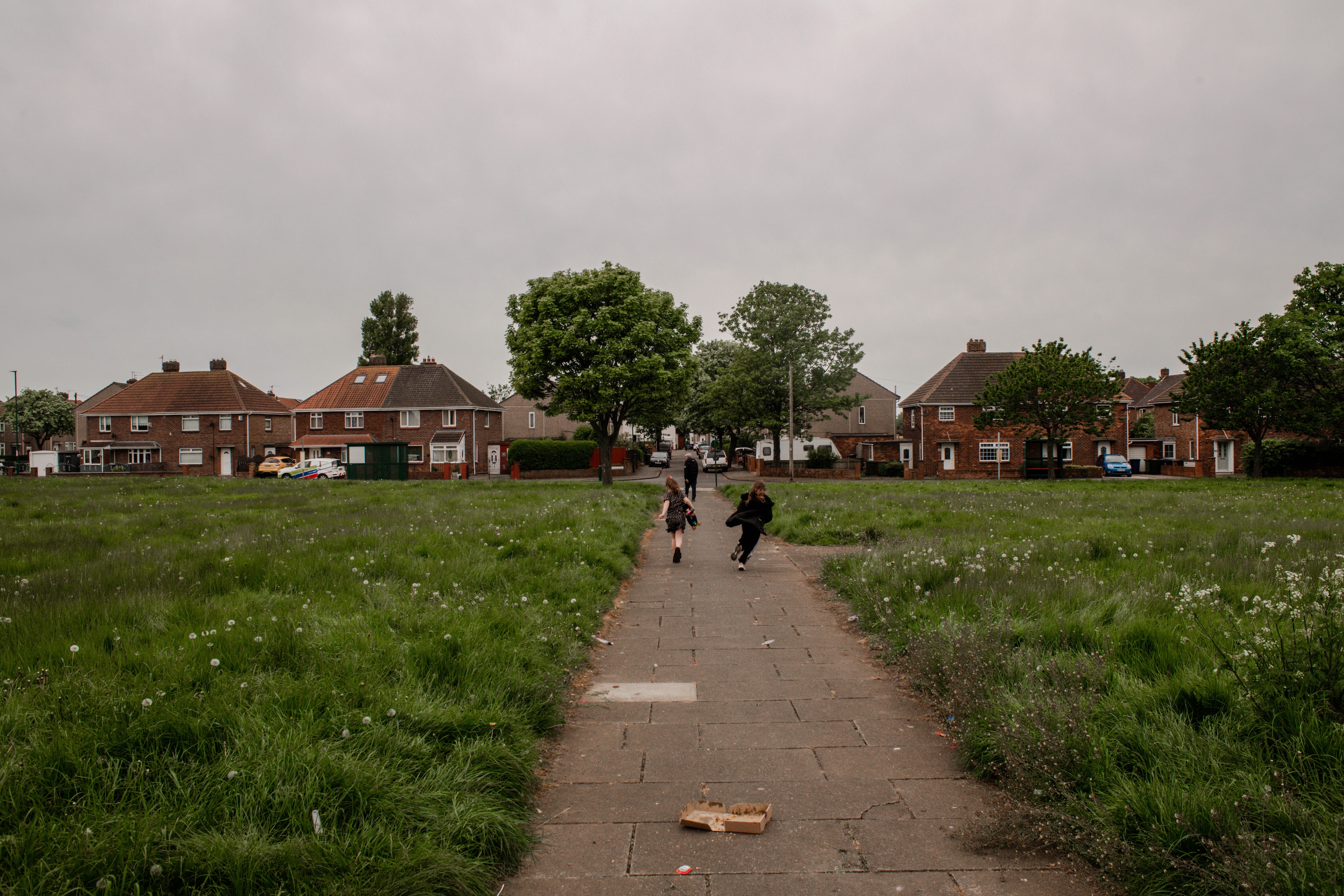 Children play in a park on a housing estate in Redcar, Teesside, May 17, 2023.