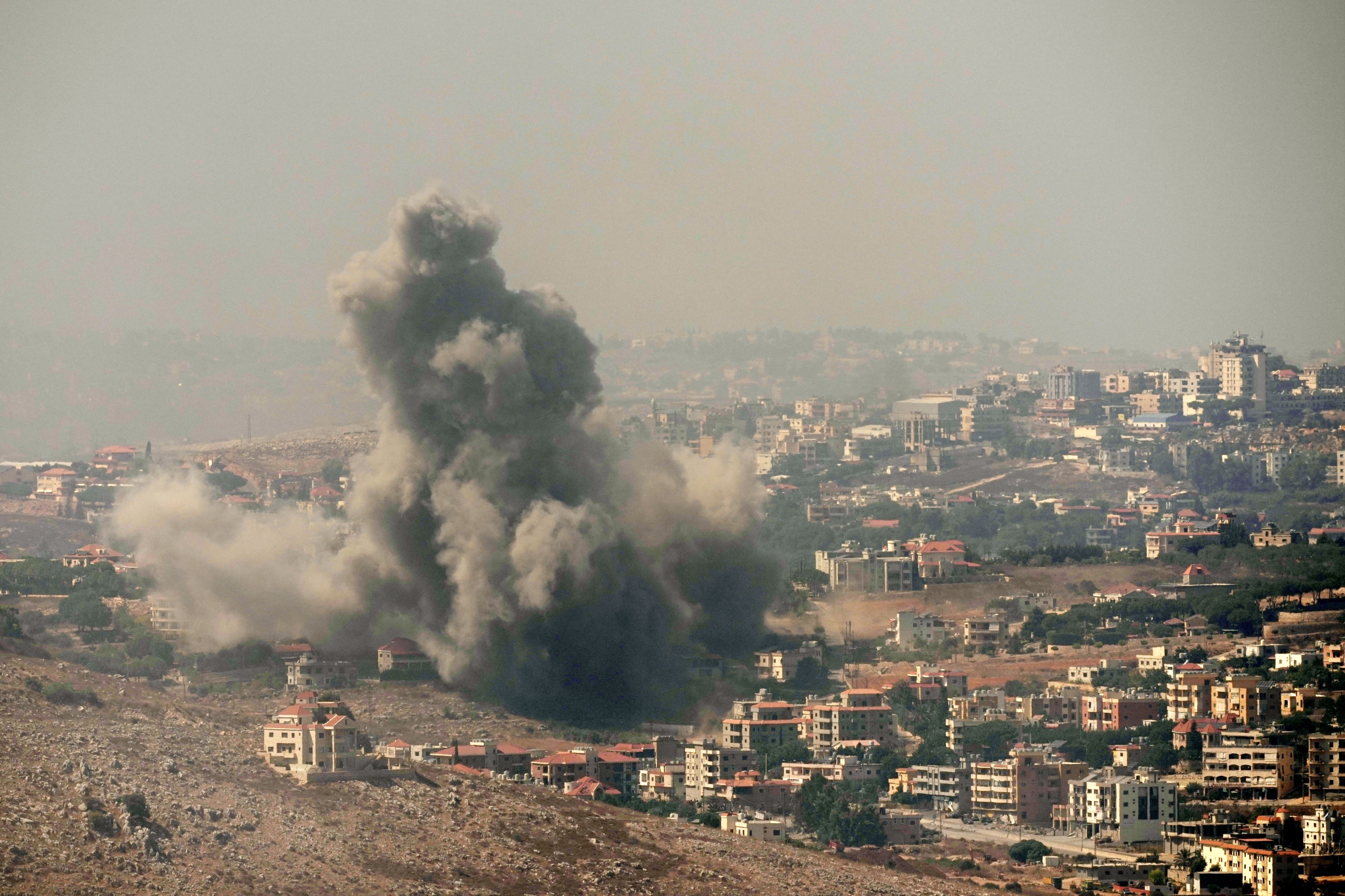 Smoke rises from Israeli airstrikes in the southern village of Kfar Rouman, south Lebanon, September 25, 2024.