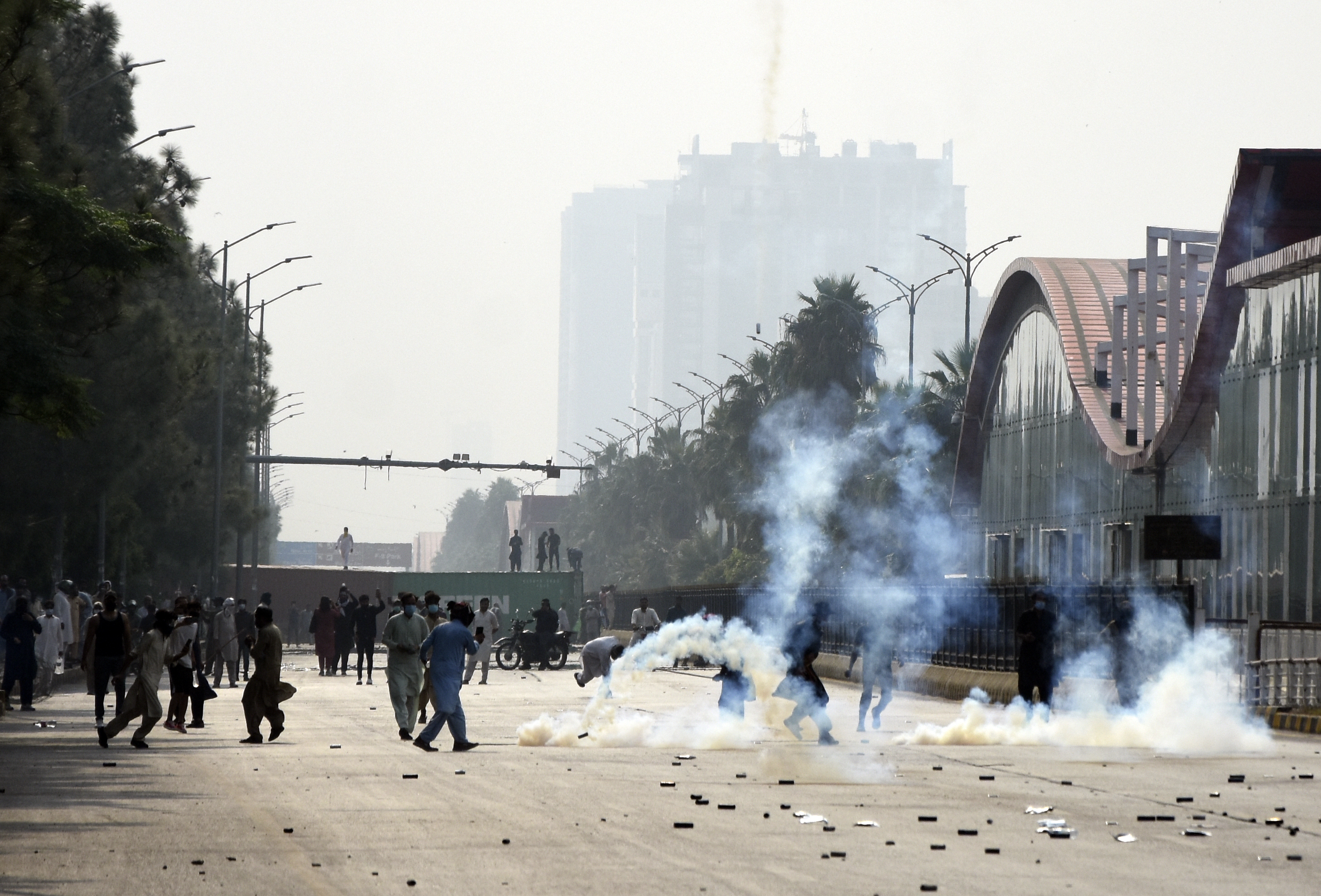 Police officers fire tear gas to disperse the supporters of imprisoned former Prime Minister Imran Khan's Pakistan Tehrik-e-Insaf party, during a protest in Islamabad, Pakistan, October 5, 2024.