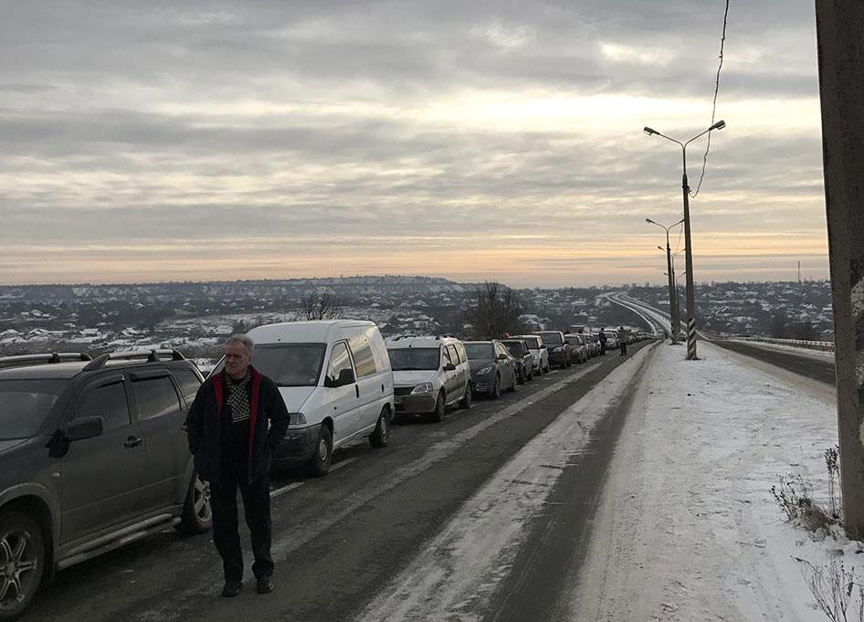 Civilians waiting at the Novotroitske crossing point in the government-controlled Donetsk region, December 21, 2016.