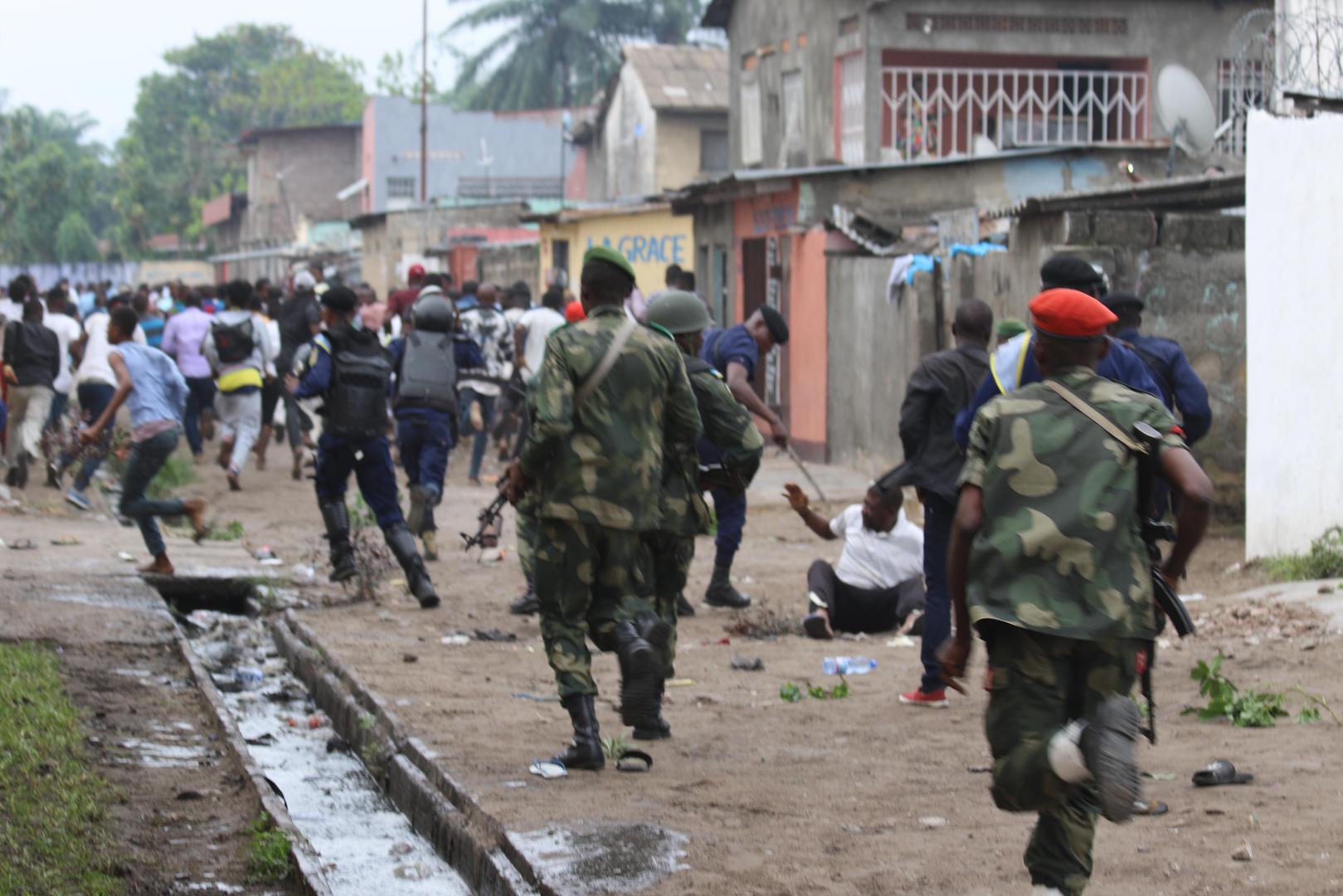 Security forces pursue peaceful protesters in Kinshasa, capital of the Democratic Republic of Congo, on December 31, 2017.