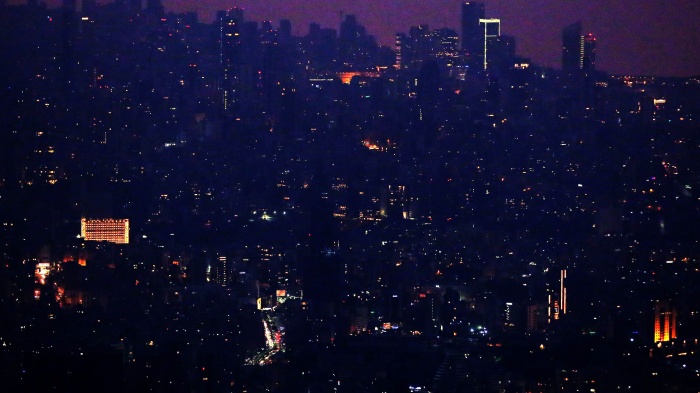 Lebanon's capital, Beirut, in the dark on July 27, 2020, due to widespread electricity blackouts caused by fuel shortages in the midst of a dire economic crisis. 