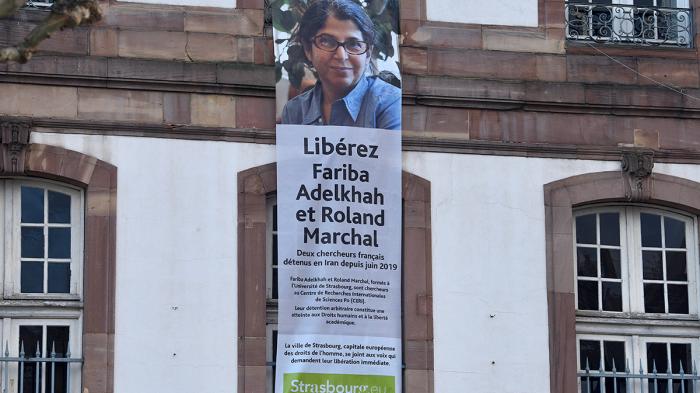 Message on the facade of the Strasbourg City Hall in France calling for the release of Fariba Adelkhah and Roland Marchal, two French scientists detained in Iran since June 2019.