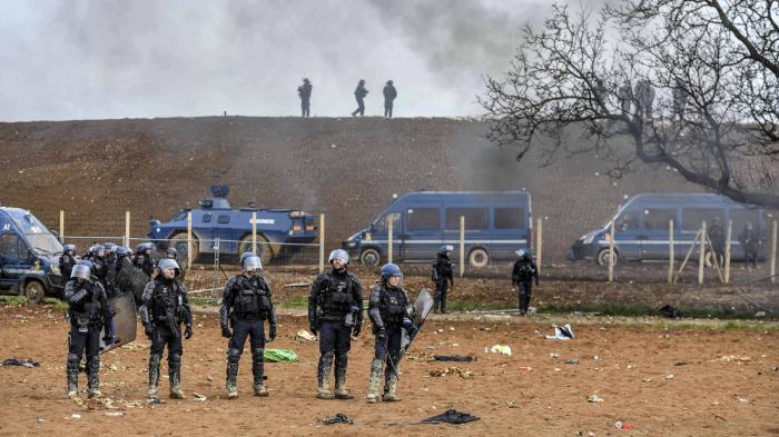 Mobile riot gendarmes policing a protest against the construction of a new water reserve for agricultural irrigation in Sainte-Soline, France March 2023. 