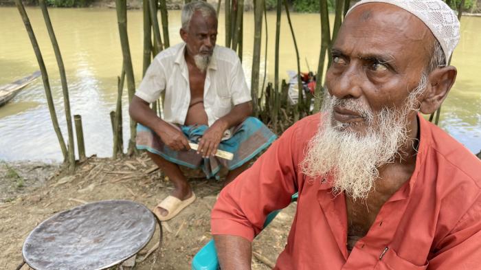 Mohammad Abdul Gani (right) from Biswanthpur, Sylhet, 75, described the temporary shelter where he stayed for 15 days as "another nightmare." 