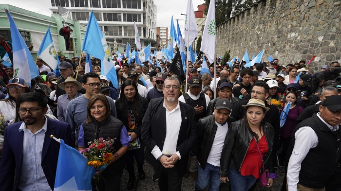 Bernardo Arévalo, Guatemala's incoming president, center, leads demonstrators during a protest at the Supreme Court of Justice in Guatemala City, Guatemala, December 7, 2023.