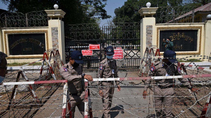  Prison officials outside of Insein prison in Yangon, February 12, 2022. 