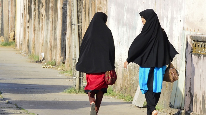 Girls walk along a road in Kattankudy, Sri Lanka, April 25, 2019.