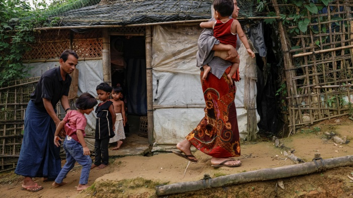 A family who fled from Buthidaung, Myanmar, at a refugee camp in Cox's Bazar, Bangladesh, June 25, 2024.