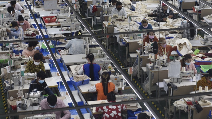 Garment workers at a factory in Phnom Penh, Cambodia, December 17, 2021.