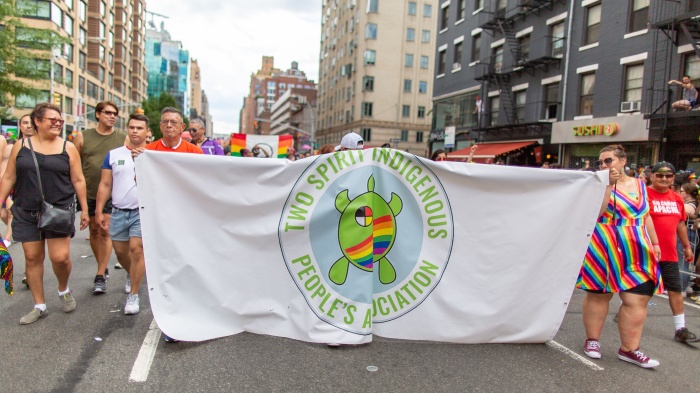 NYC Pride March: WorldPride 2019 | Stonewall 50, 5th Avenue, NYC, Manhattan, New York, United States - 30 Jun 2019. Members of the Two Spirit Indigenous Peoples Association march during World Pride in New York City, June 30, 2019. 