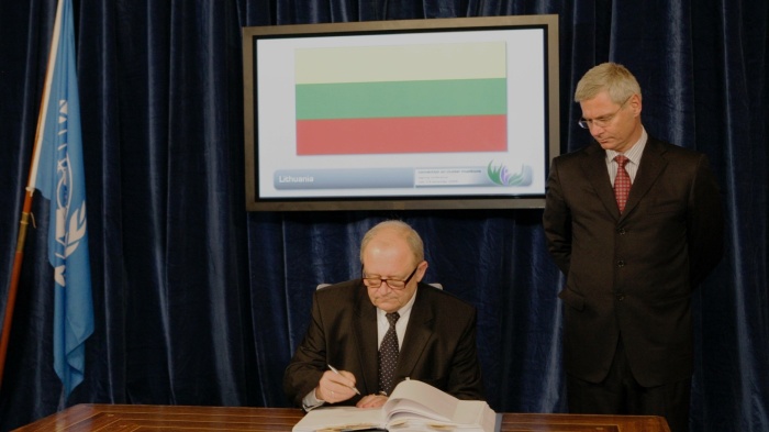 Lithuania’s representative signing the Convention on Cluster Munitions in Oslo, Norway on December 3, 2008.