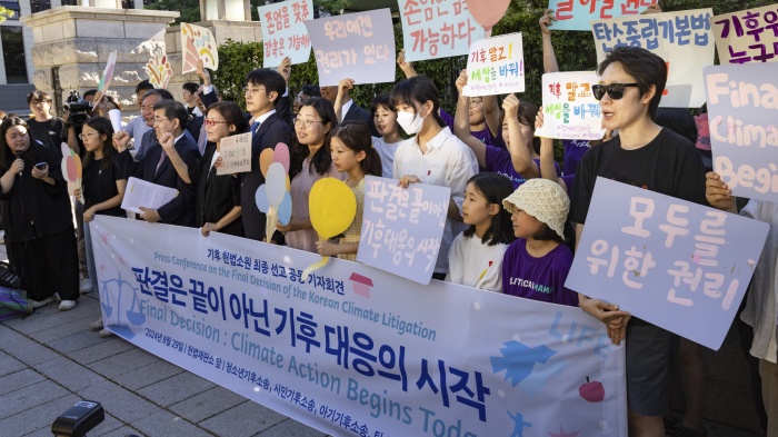 Youth climate litigants and citizen groups involved in climate lawsuits at a joint press conference in front of the Constitutional Court in Jongno-gu, Seoul, South Korea, August 29, 2024.