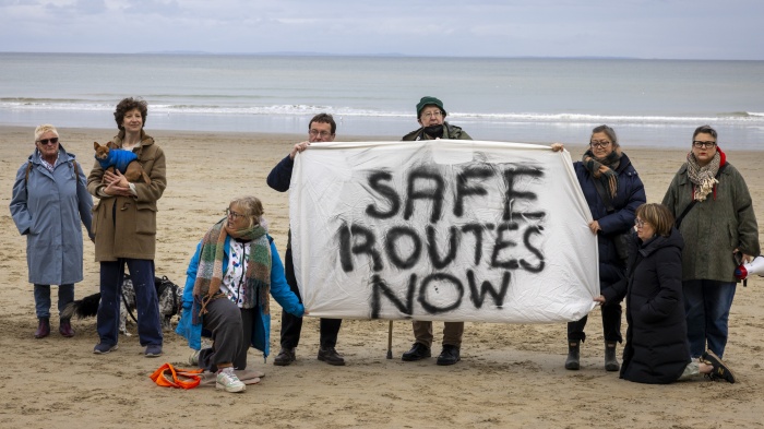 A vigil on Sunny Sands Beach to remember those who have lost their lives crossing the English Channel and to demand safe routes, Folkestone, United Kingdom. 