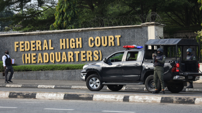 Members of the Nigerian police force are seen outside the Federal High Court, in Abuja, Nigeria, on October 21, 2021.