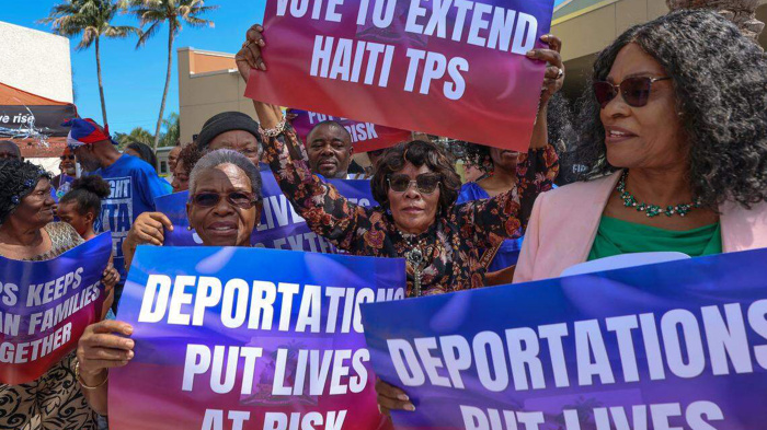 Members of the Haitian community rally in support for the extension of TPS and against deportation in Miami, Florida April 26, 2026.