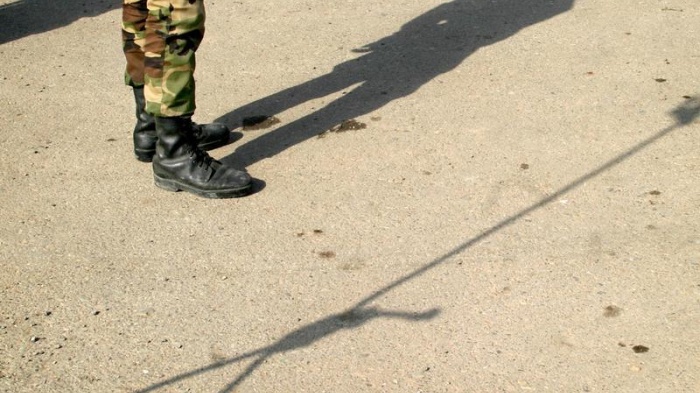 Shadows of an Iranian policeman and a noose are seen on the ground before an execution in Tehran, Iran. 