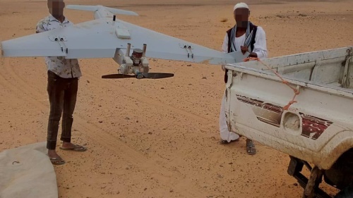  Sudanese armed forces with an unexploded, one-way attack drone from the Rapid Support Forces recovered from an attack on a government building in Gedaref, Sudan, July 11, 2024. 