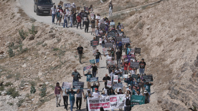 Activists rally in support of the Bedouin communities of Khan al-Ahmar in the occupied West Bank, June 12, 2026. 