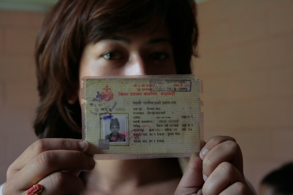 a trans woman activist in Kathmandu, holds her nagarikta (citizenship card)