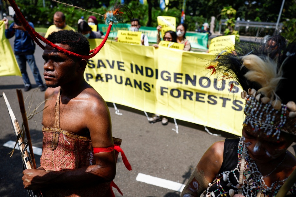 Activists protest against deforestation by palm oil companies on Indigenous land in Papua, outside the Supreme Court in Jakarta, Indonesia, May 27, 2024. 