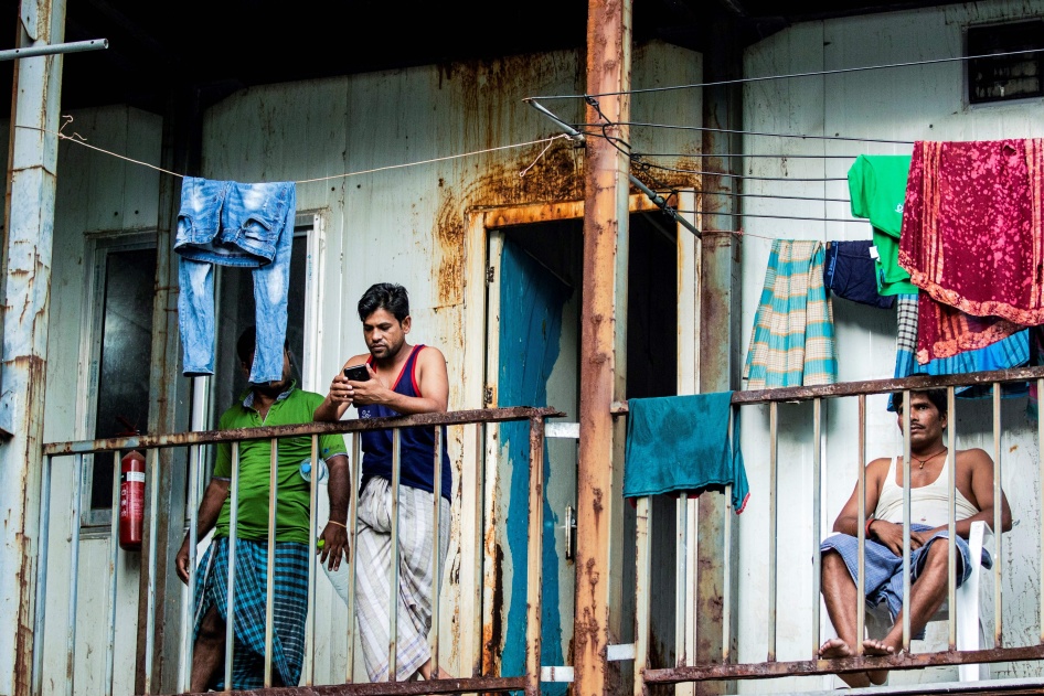 Workers from Bangladesh gathering in their accommodation block in Malé, Maldives, May 9, 2020. 