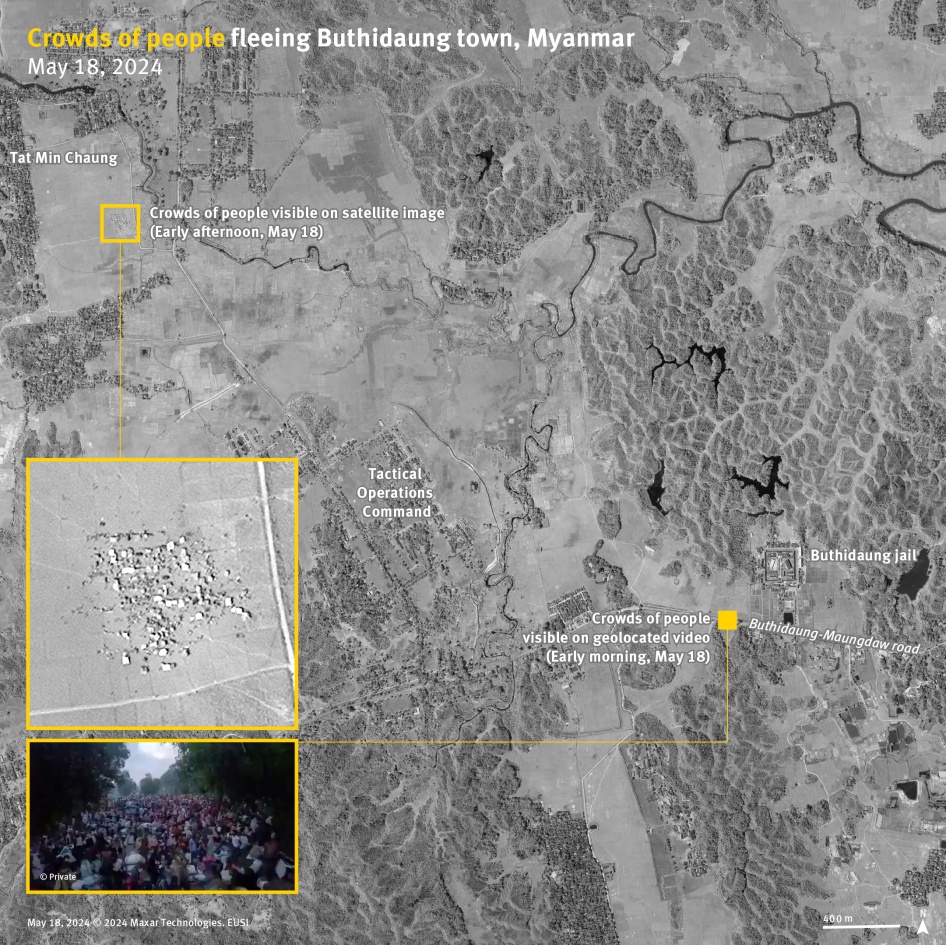 Satellite image showing crowds of people next to Tat Min Chaung village.