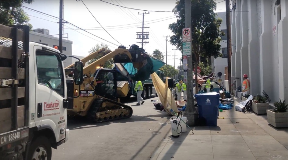 ASAN crews destroying a tent and other property of unhoused people during a sweep